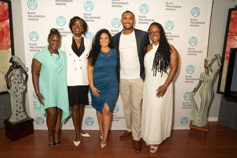 Rosiland Moore with four other guests at a Black Philanthropy Initiative event